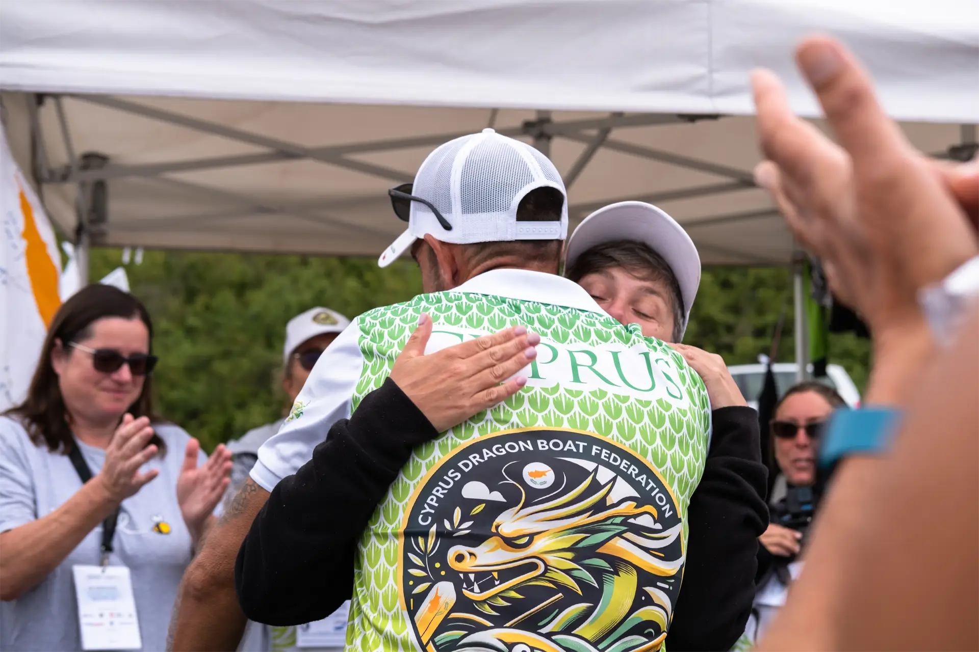 dragon boat cyprus national team hugging