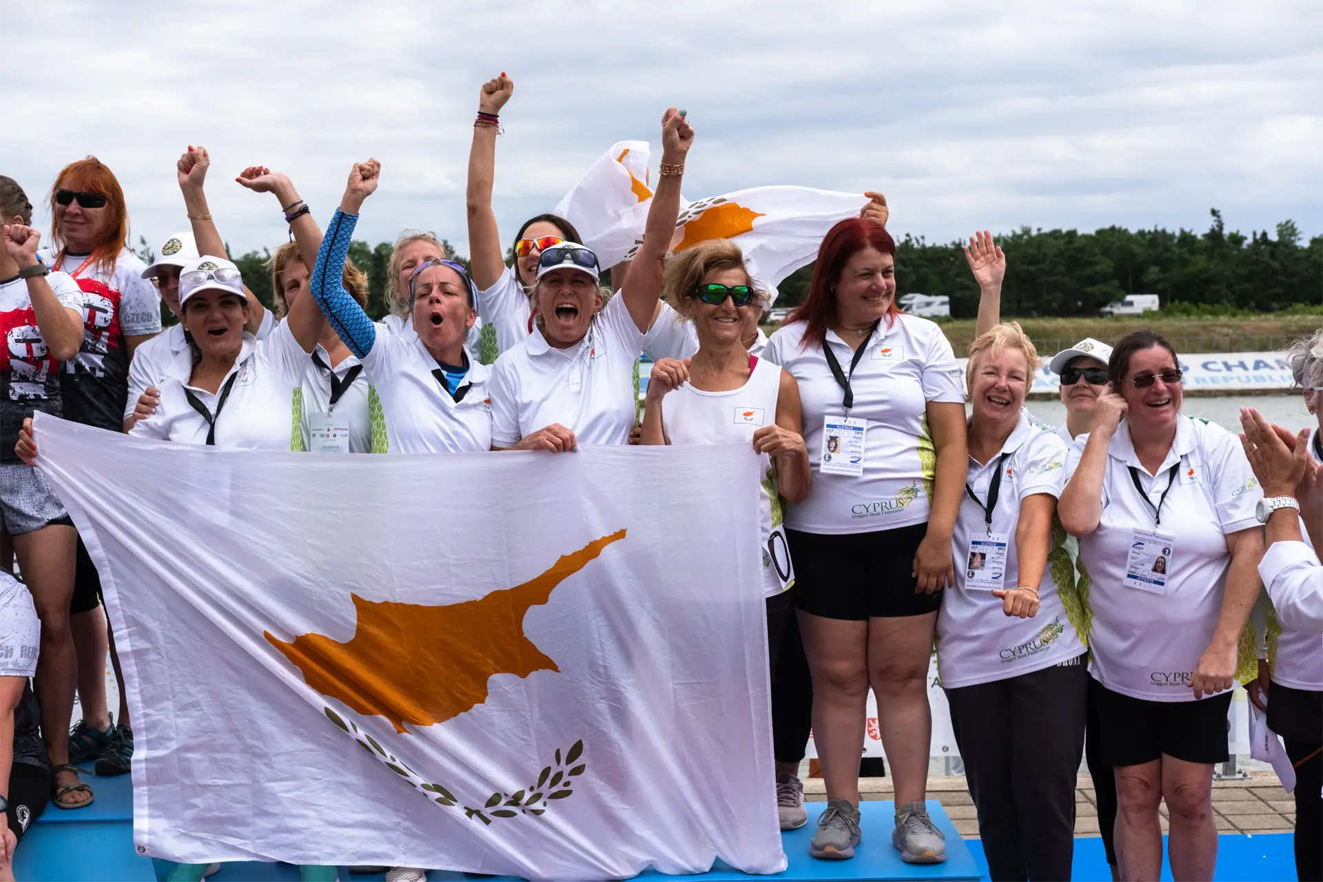 dragon boat cyprus national team cheering on podium