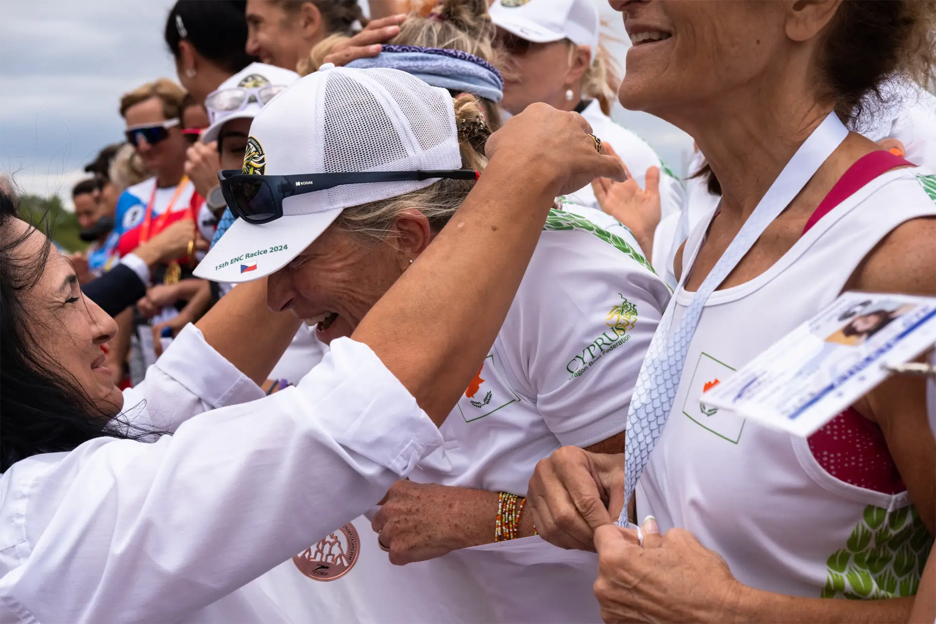 dragon boat cyprus national team paddler receiving medal