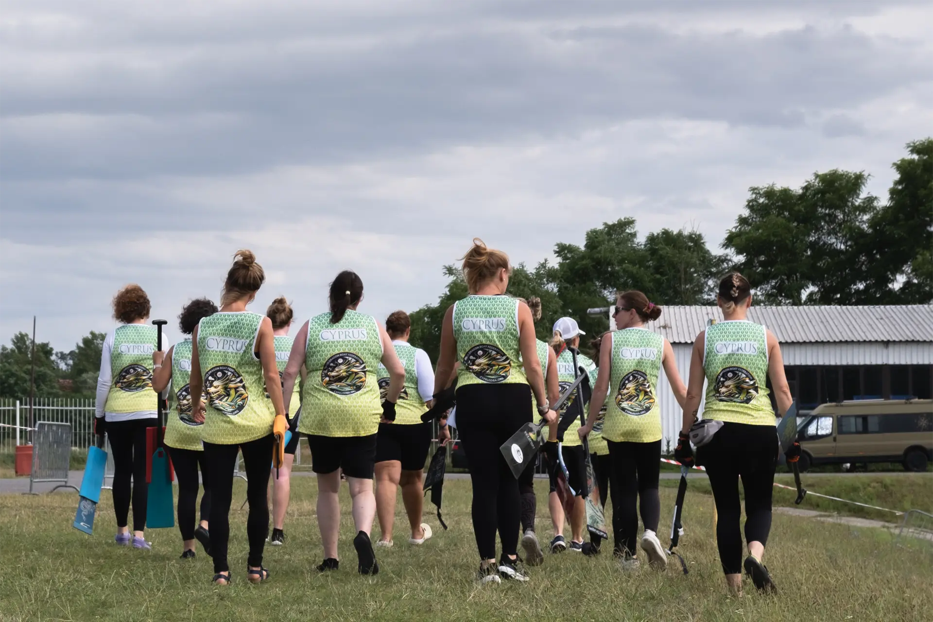 dragon boat cyprus national team female paddlers walking