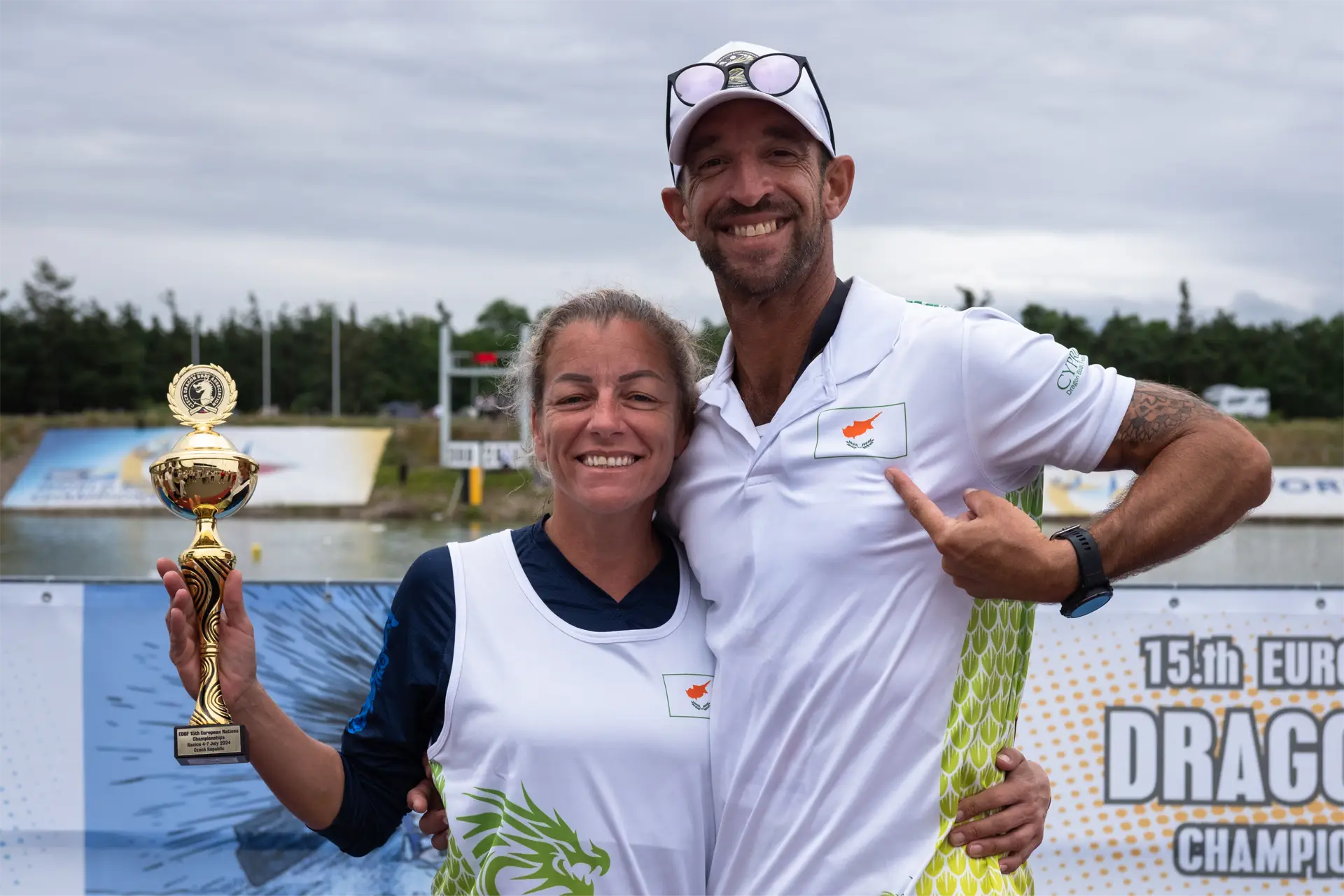 dragon boat cyprus national team coach simeon hill with a female paddler