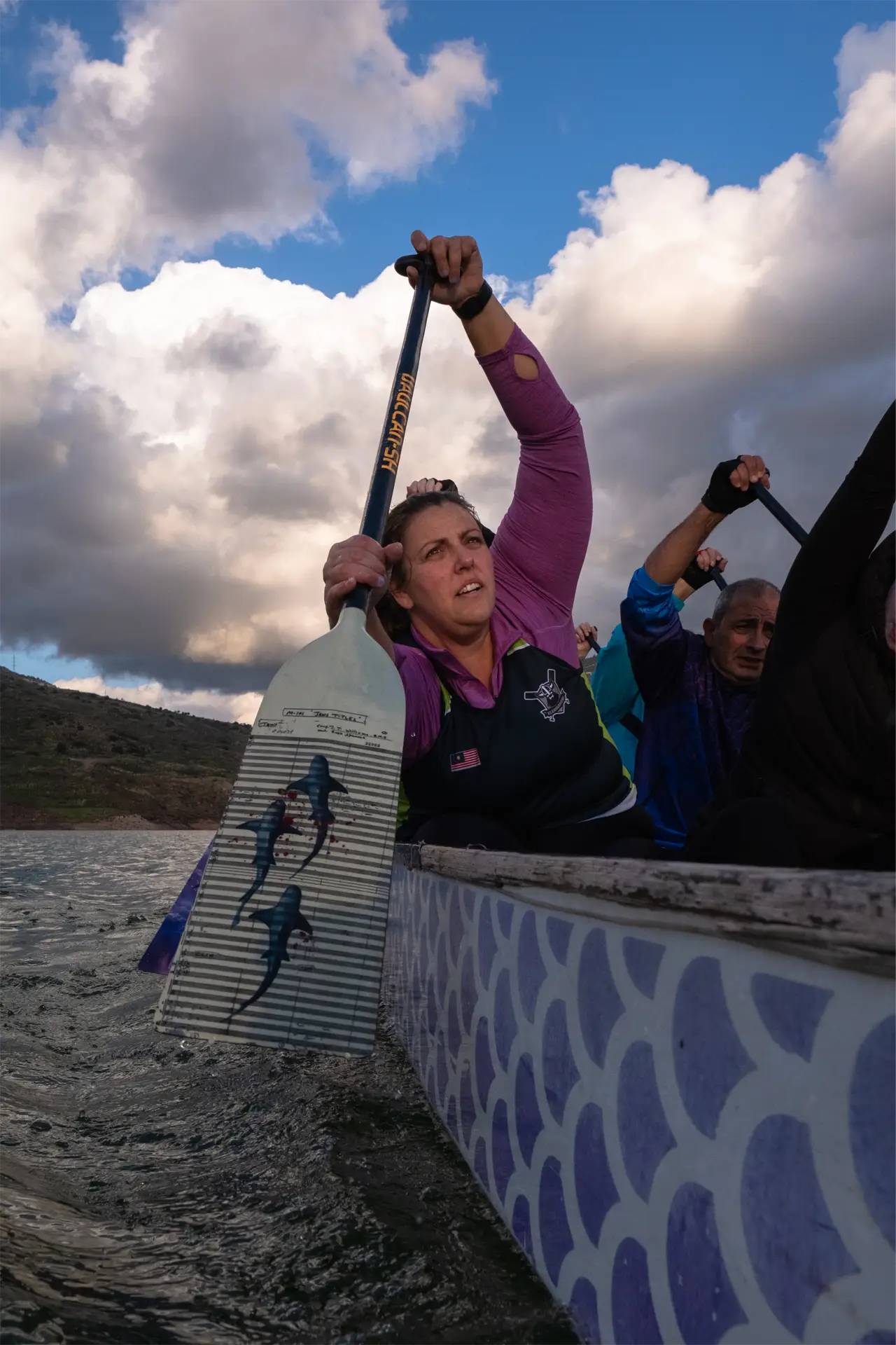 dragon boat cyprus sharks woman paddling