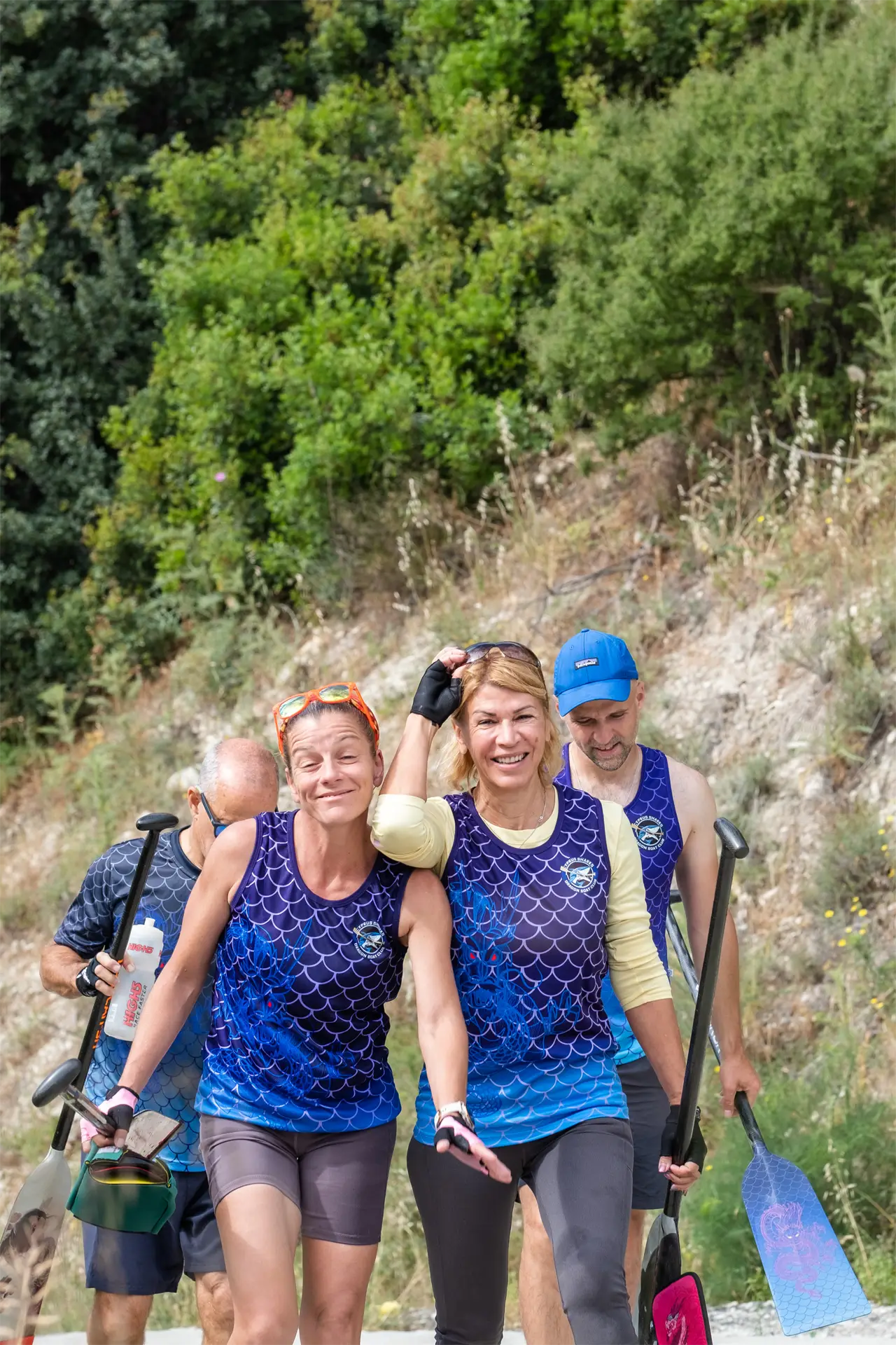 dragon boat cyprus sharks limassol two women walking